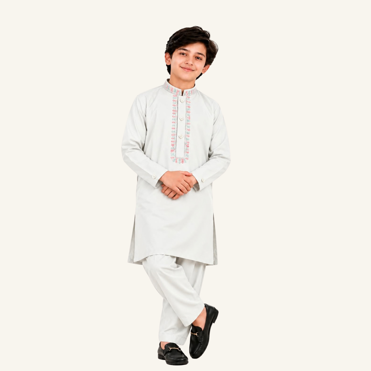 Off White boys’ winter kurta shalwar showing pink-and-mint accents around the front opening