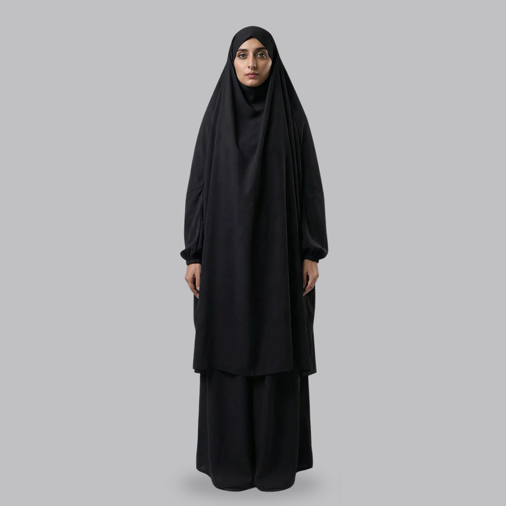 Women’s black two-piece jilbab with a draped top and long skirt