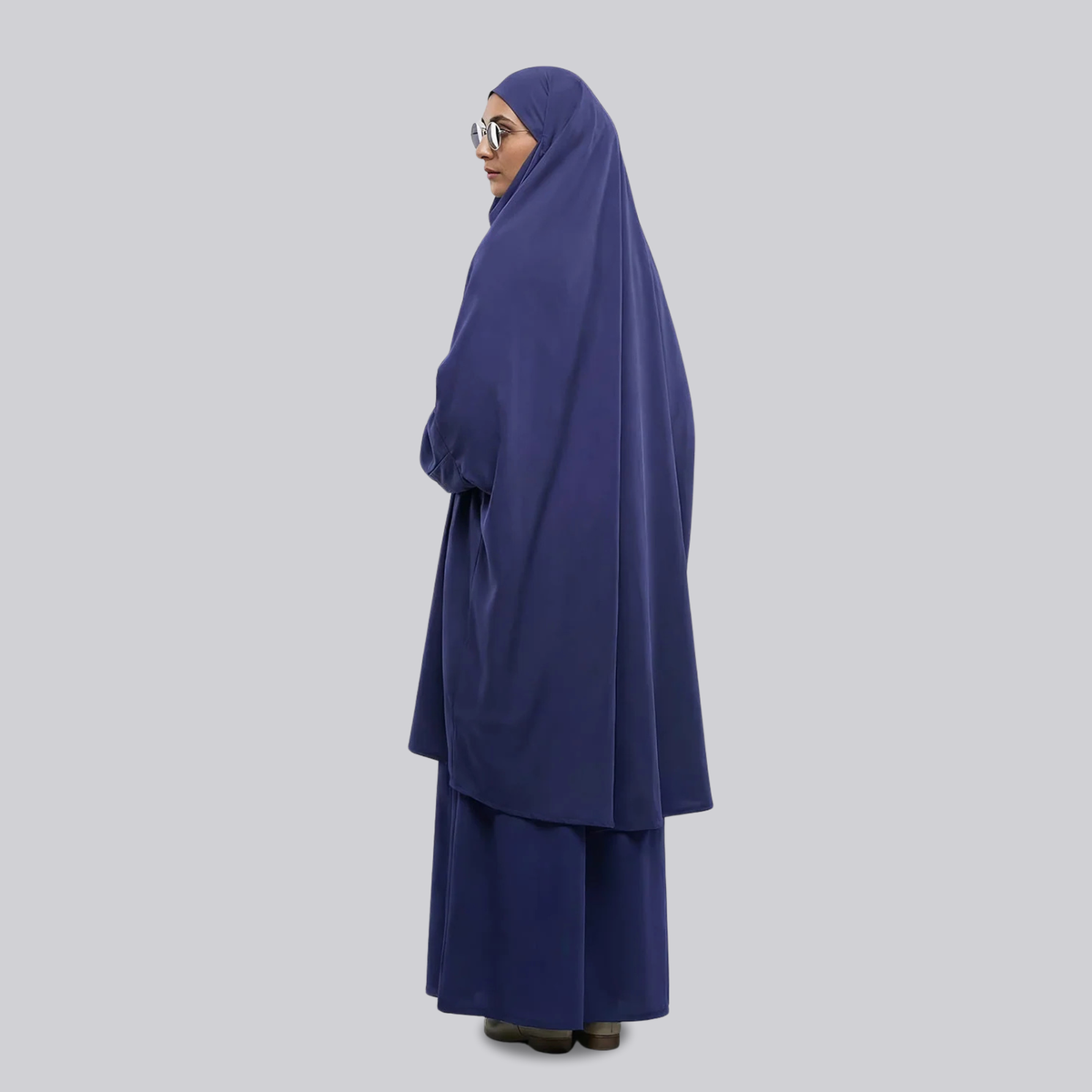 Side view of the navy blue two-piece jilbab with long top and full-length skirt