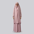 Women’s light pink two-piece jilbab with a draped top and long skirt