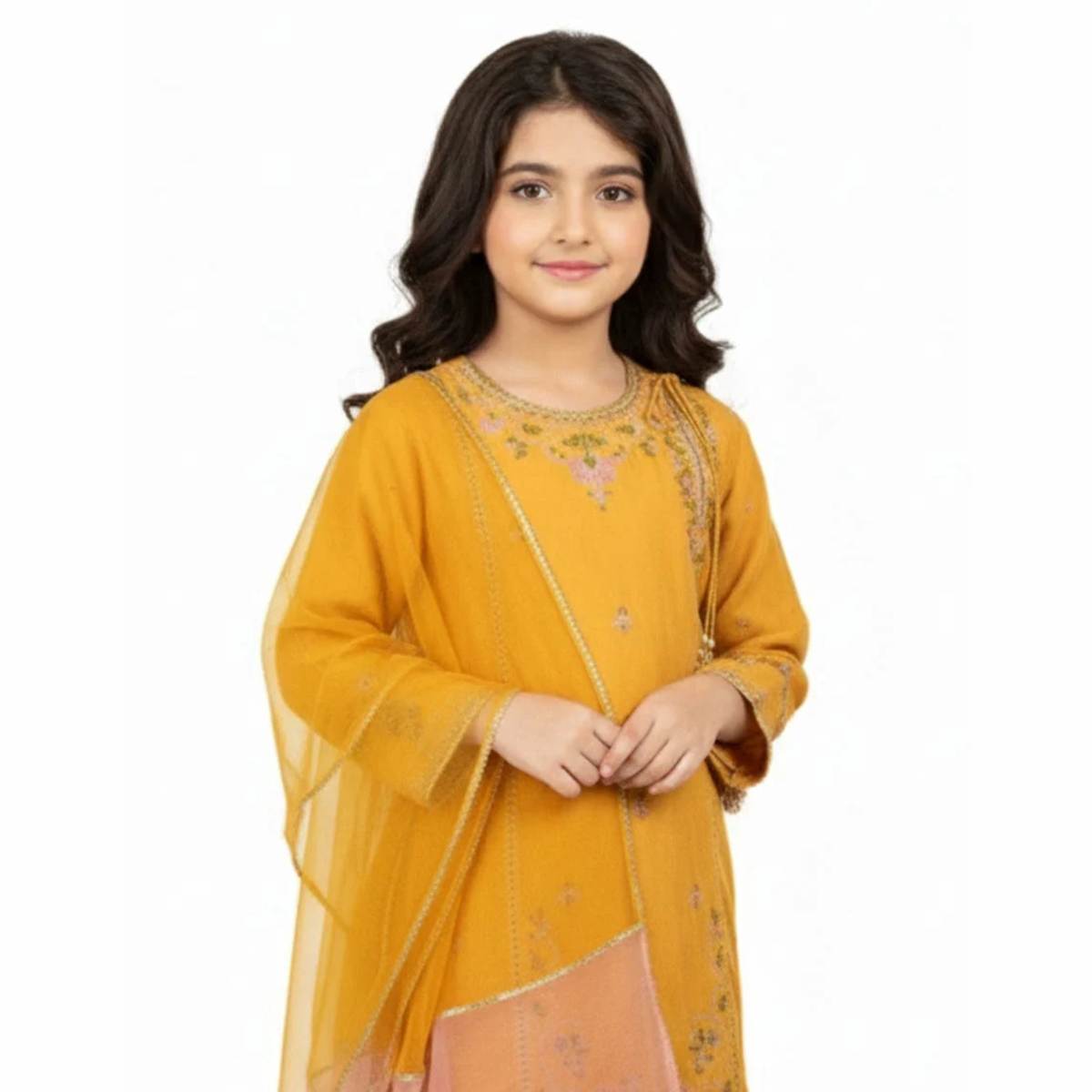 Girl wearing the mustard embroidered kurta with its sheer matching dupatta