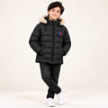 Boys’ black CK quilted puffer jacket with a trimmed hood, zip front and pockets