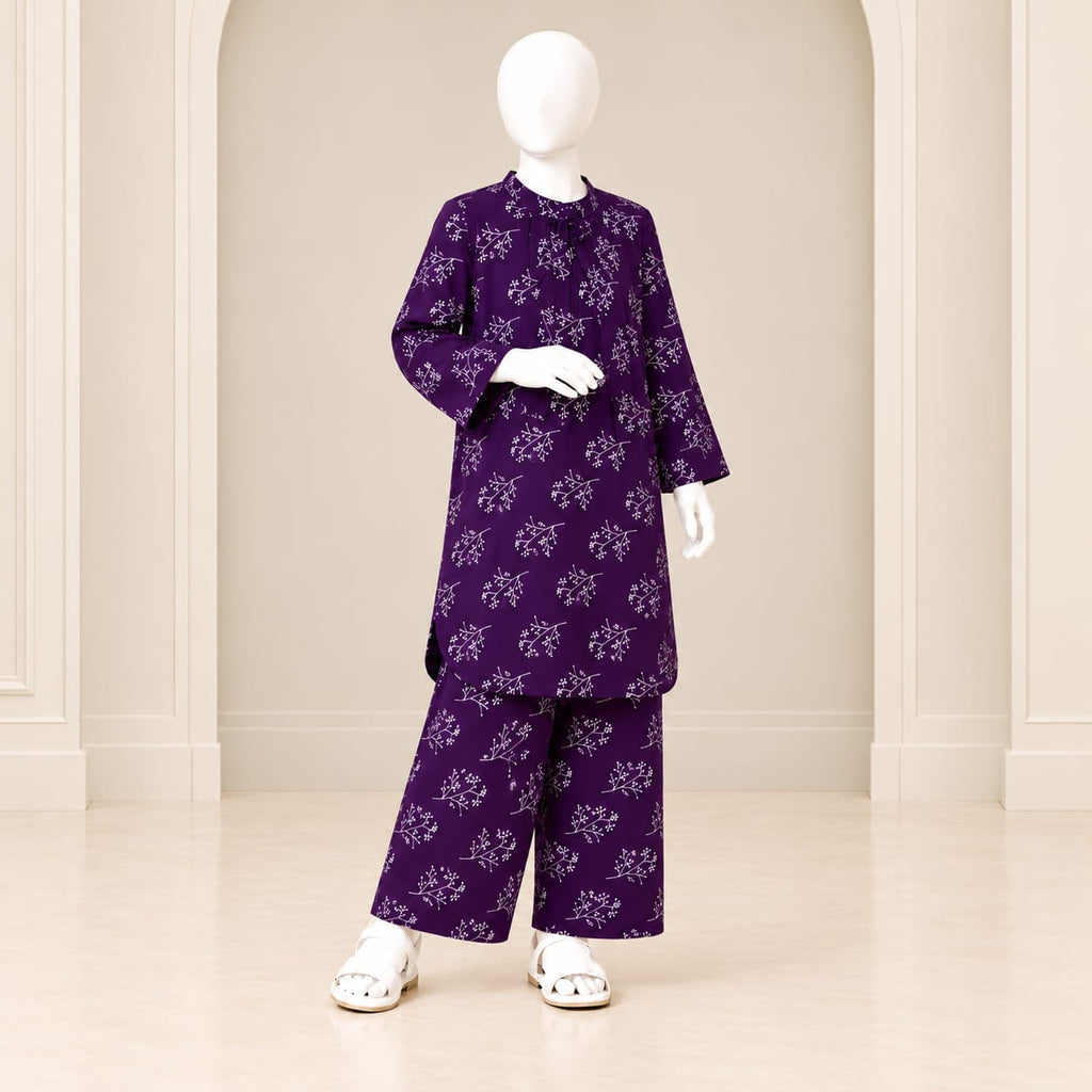 Girls’ purple two-piece suit with small light-coloured floral sprigs over purple fabric, a long-sleeved top and matching trousers
