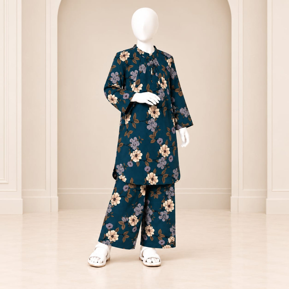 Girls’ zinc two-piece suit with cream and lilac flowers with contrasting leaves, a long-sleeved top and matching trousers